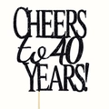 Close-up of black glitter 'CHEERS TO 40 YEARS!' cake topper for 40th anniversary party - 40 Years / Black