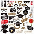 Black and gold graduation photo booth props kit with Congrats GRAD and PhD hat designs - 42-Piece Set (mys0256-5)