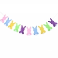 Easter bunting with colorful felt bunnies and white pompom tails on a string - Colorful Bunny Banner