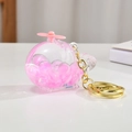 Portachiavi elicottero rosa con perle galleggianti in una capsula trasparente - Catena Oro Chiaro + Aereo Luminoso / Rosa