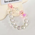 Detail of iridescent acrylic bead phone strap with a purple cartoon girl charm - Mermaid Chain / Gate Buckle Chain / Pink
