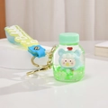 Porte-clés bouteille de sable mouvant avec figurine ours et bracelet en silicone bleu - Dragonne Dégradée + Bouteille de Liquide / Vert