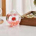 Detail of heart acrylic keychain with moving liquid red rose and golden ring - Light Gold Chain + Rose Heart Lock / Pink