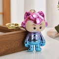 Cartoon astronaut keychain with colorful UV electroplating and Luck embossed text - Pale Blue