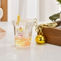Creative milk tea cup keychain with floating white cat and orange glitter liquid sand - Bell Style [Lemon Yellow]