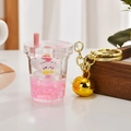 Cute white cat milk tea cup keychain with pink liquid glitter and golden bell - Bell Style [Pink]