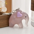Close-up of translucent purple elephant keychain with acrylic texture and silver ring - Light Purple