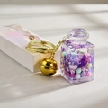 Pastel beads liquid quicksand keychain with pink square bottle and laser strap - Leather Rope Style (Purple)