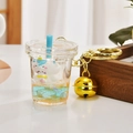 Cute bunny liquid oil bubble tea keychain with blue unicorn charm and golden bell - Bell Style [Blue]