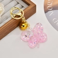 Portachiavi a farfalla in acrilico rosa con glitter, campanellino d'oro e paillettes - Rosa Fluorescente