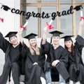 Black glittery congrats grad banner with mortarboard caps for 2026 graduation party - Black congrats grad