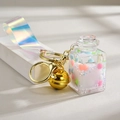 Pink heart quicksand bottle keychain with rainbow strap and golden bell accessory - White with Laser Strap