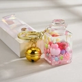 Pink quicksand bottle keychain with colorful beads, sequins and large golden bell - Leather Rope Style (Pink)