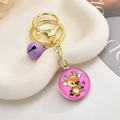 3D cartoon zodiac ox keychain with purple bell and lobster clasp on a white tray - Purple Cow / Light Gold Chain + Small Gemstones + Bell