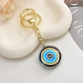 Retro golden evil eye owl keychain accessory on a white aesthetic ceramic tray - Light Gold Chain + Eye / Blue-Yellow