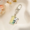 Panda emaille sleutelhanger met bamboe hanger en geluksgravure op een elegant dienblad - Roze Strepen Boog