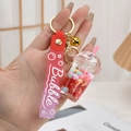 Pink bubble tea keychain with gradient silicone wristlet and liquid shaker charm - Red