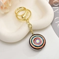 Artistic round evil eye keychain with blue and pink circles on a gold chain - Light Gold Chain + Eye / Orange Red