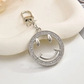 Portachiavi con ciondolo a faccina argentata con strass scintillanti e design lucido - Portachiavi + Pendente / Faccina Sorridente Argento