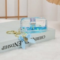 Porte-clés acrylique sables mouvants avec liquide bleu et figurine lapin pour sacs - Bleu