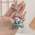 Star-shaped acrylic liquid keychain with panda donut figure and blue drifting sequins - Star Panda Style