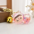 Pink transparent kitty keychain with cute doll face and golden bell accessory - Light Gold Buckle + Cute Cat + Bell / Sparkling Pink