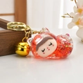 Pink resin sleeping girl keychain with red sequins and a large golden bell accessory - Light Gold Buckle + Cute Cat + Bell / Sparkling Red