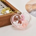 Portachiavi a cuore con liquido rosa, stelle luccicanti, perle e anello dorato - Catena Oro Chiaro + Cuore + Perla / Rosa