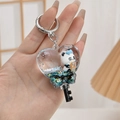 Vloeibare hartvormige sleutelhanger met blauwe panda, glitters en donut mascotte - Hart Lollipop Panda Stijl