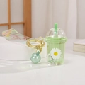 Green bubble tea cup keychain with liquid glitter, daisy print and laser strap - Daisy Quicksand Glowing Milk Tea Cup / Green