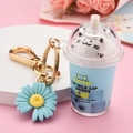 Blue cat bubble tea cup keychain with liquid sand and a cute daisy charm pendant - Little Daisy Charm Style / Blue