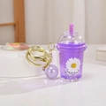 Purple bubble tea cup keychain with liquid glitter sand and white daisy flower pattern - Daisy Quicksand Glowing Milk Tea Cup / Purple