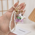 Porte-clés bouteille panda en forme d'étoile avec sable mouvant et pendentifs - Style de Chaîne / Violet