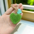 Sparkling green rhinestone heart keychain with gold ring and mint brand tag - Fruit Green