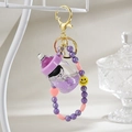 Creative purple liquid quicksand bottle keychain with a cute floating cat inside - Keychain Chain + Bottle Cat / Purple