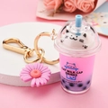 Pink cat bubble tea keychain with liquid quicksand and daisy flower resin charm - Little Daisy Charm Style / Pink