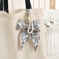 French style floral silk bow and pearl charm attached to a canvas tote bag - Ginger Yellow