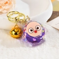 Detail of cute purple liquid glitter keychain with golden bell on soft white fur surface - Light Gold Clasp+Bell+Eggy(654856) / Sparkling Purple