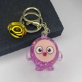 Close-up of a purple translucent glitter keychain with a golden bell and lobster clasp - Light Gold Clasp+Bell+Eggy(654856) / Noctilucent Purple Rose