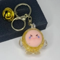 Detail of yellow glitter liquid keychain with cute crying-laughing emoji and metal bell - Light Gold Clasp+Bell+Eggy(654856) / Luminous Yellow