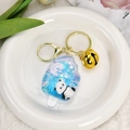 Porte-clés créatif panda en forme de glace avec sable mouvant bleu et cloche dorée - Bleu