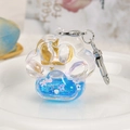 Portachiavi zampa di gatto con sabbie mobili blu e paillettes di fiori di ciliegio - Forma a Zampa di Gatto