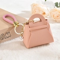 Mini llavero de bolso en cuero PU rosa palo con cordón trenzado y colgante de perla - Rosa