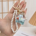 Portachiavi a stella con sabbie mobili orso blu e cinturino di perle elegante - Blu Con Catena