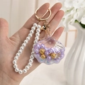 Llavero de concha de arena movediza con colgante morado y correa de perlas para bolsos - Estilo de cadena de bolas / Morado