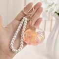 Llavero de concha creativa con perlas iridiscentes y correa de pulsera de perlas doradas - Estilo de cadena de bolas / Colorido