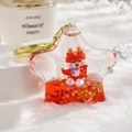 Star-shaped liquid quicksand keychain featuring a red cartoon dragon and gold sequins - Red Dragon Oil Bottle [Star Shape]