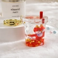 Cartoon red dragon milk tea cup keychain with liquid red quicksand and gold star sequins - Red Dragon Oil Bottle [Milk Tea Cup]