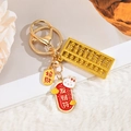 Goldener Abakus-Schlüsselanhänger mit chinesischen Glücksbringern und rotem Hasen-Tag - Reichtums-Amulett