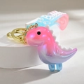Portachiavi a forma di dinosauro luminoso con sfumatura colorata e cinturino - Blu Tiffany